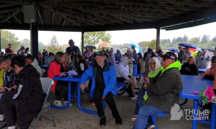 Survivors’ Strength Radiates Amid Rainy Day